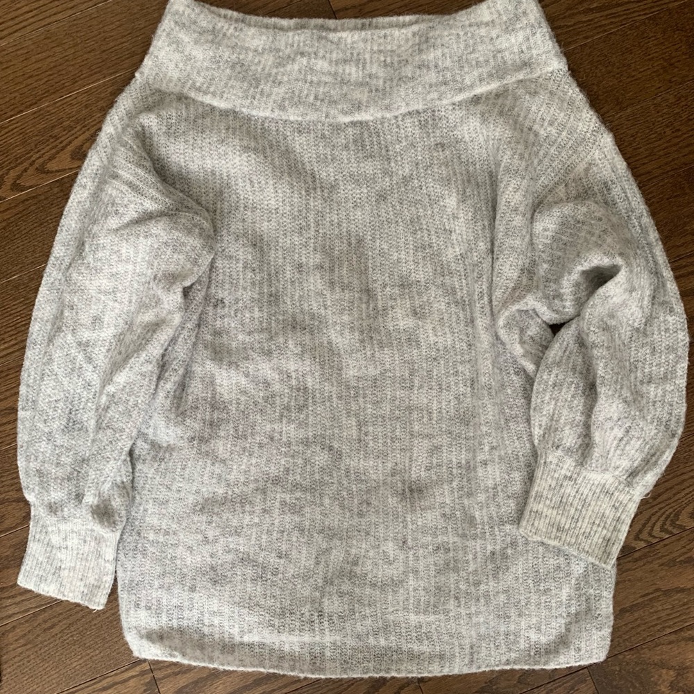 Off the shoulder sweater.